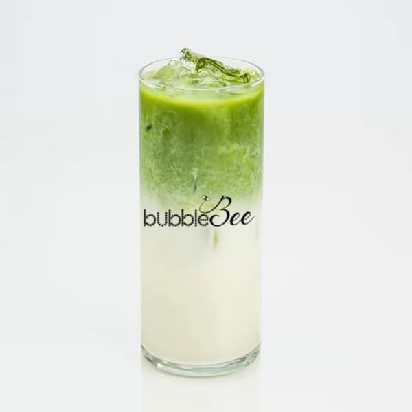 BubbleBee's iced matcha latte, with a vibrant green top layer and creamy white bottom layer.